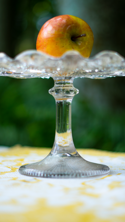 Pedestal de vidrio con rayos de sol