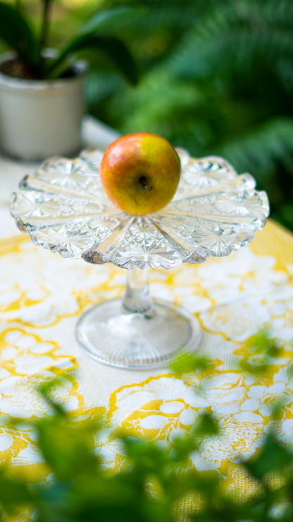 Pedestal de vidrio con rayos de sol